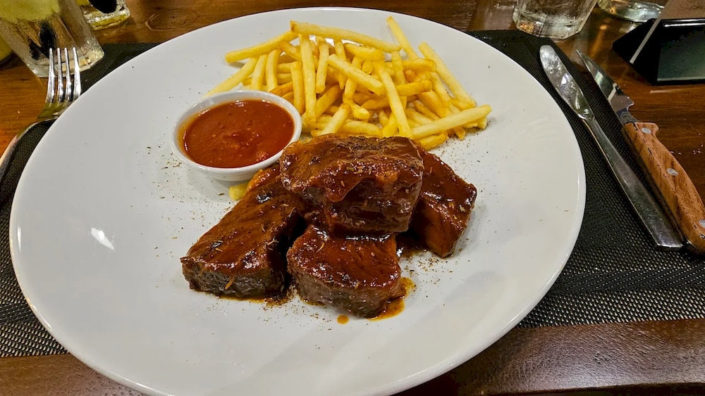 Steaks at La Cabana are grilled over charcoal to retain their signature smoky aroma